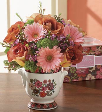 roses, mini gerbera, waxflower in cachepot