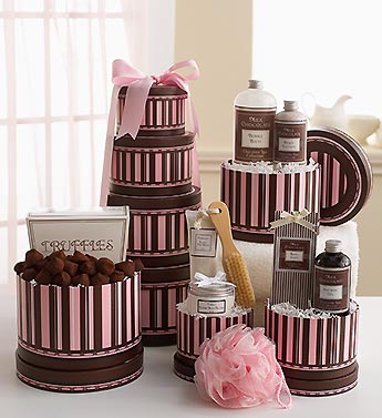 pink and brown boxes with spa gifts and treats