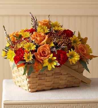 fall basket with roses, sunflowers, mums