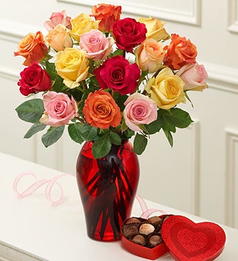 multicolored rose in red vase